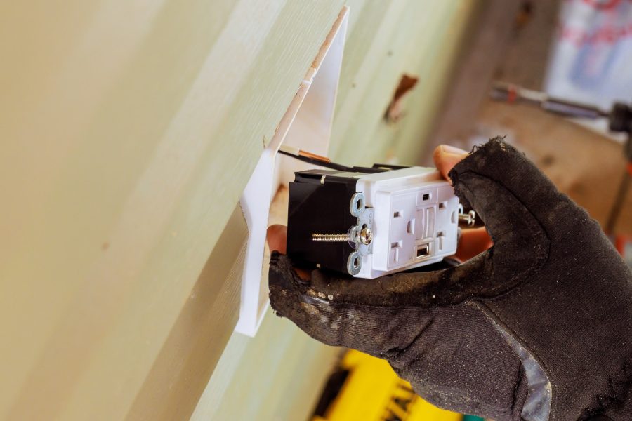 Electrical outlet repair and replacement by Hulgan in Perry, Iowa